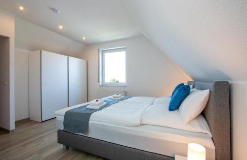 Korbecke Apartment | Ferienwohnung Möhnesee - zentral, stilvoll und ruhig mit Balkon und Boxspringbetten