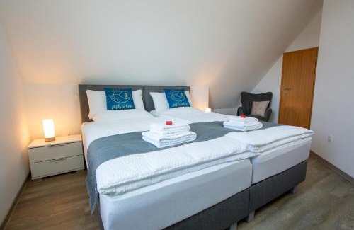 Korbecke Apartment | Ferienwohnung Möhnesee - zentral, stilvoll und ruhig mit Balkon und Boxspringbetten