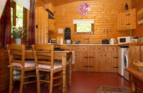 St. Florence House | Fiddlers Green Log Cabin Tenby