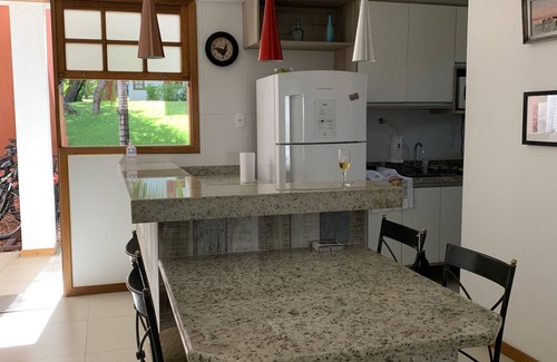 Praia do Forte Apartment | First floor apartment, garden view, peace and quiet for you in Praia do Forte