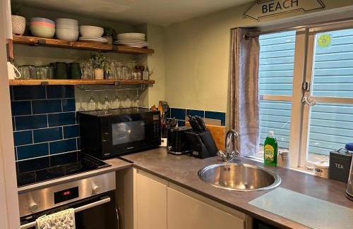 Sheringham House | Fishermans Flint cottage