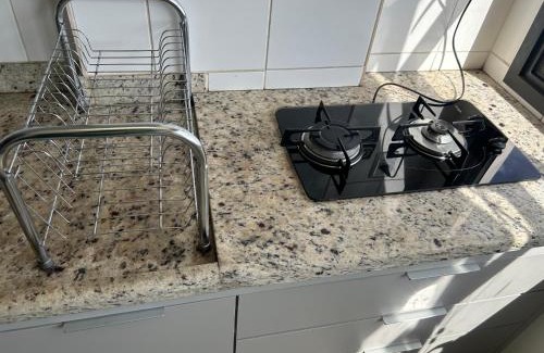 Plano Diretor Sul Apartment | Flat completo no centro.