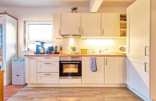 Muritz Villa | FLEESENTRAUM Seevilla Kormoran - Direkt am Fleesensee - Familien und Aktivurlauber - Whirlpool Sauna Garten Nintendo - SUP Kanu Kajak inklusive