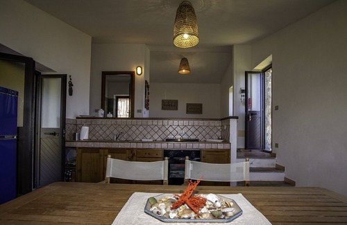 Trinita d'Agultu e Vignola House | Gallurese stazzu in the countryside with sea view above Li Feruli