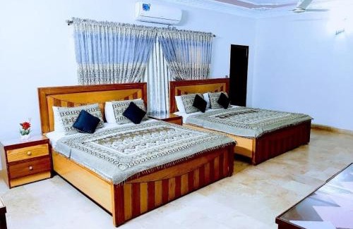 Gulshan-E-Jamal Bed & Breakfast | Galaxy Inn - Near Jinnah International Airport Branch
