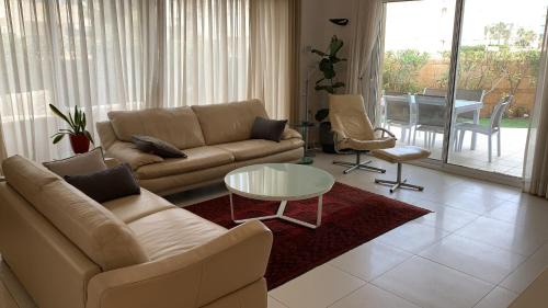 Herzliya Pituach Apartment | Garden Apartment Herzliya Marina. Pool & Gym