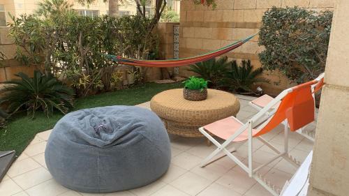 Herzliya Pituach Apartment | Garden Apartment Herzliya Marina. Pool & Gym
