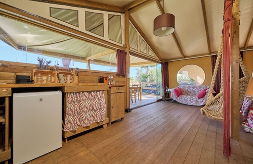 Piombino RV Rental | Glamping 'Tenda Glamping Vicino Al Mare' with Terrace, Garden and Wi-Fi