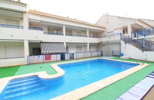 Playa de Almarda Apartment | Global Properties, Apartamento con piscina en playa Corinto