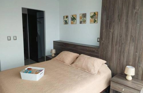 Guayaquil Apartment | GOLD SUITE CON VISTA A CIUDAD/PISCINA/GYM/PARQUEO