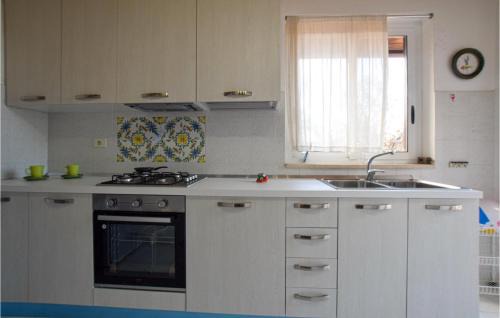 Milo House | Gorgeous Home In Caselle With Kitchen