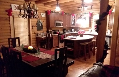 White Oak Cabin | Gorgeous lakefront log home on secluded cove with private beach and boat dock