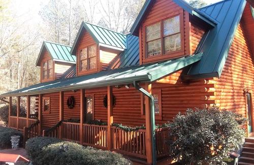White Oak Cabin | Gorgeous lakefront log home on secluded cove with private beach and boat dock