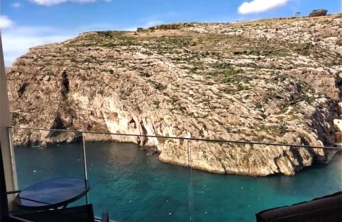 Xlendi Apartment | Gozo Xlendi Coastal Apartment with Stunning Sea View, Free Private Parking, AC & WiFi