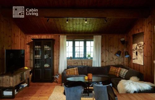 Nes House | Grand cabin at Nesfjellet with lovely view, inddor Jacuzzi & sauna