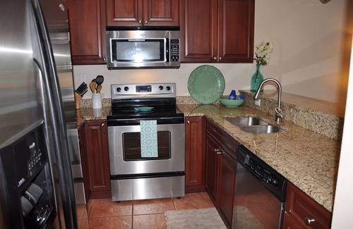 Estate Enighed Condo | Grande Bay Resort - Mojo Blue 1BR Condo Beachfront!