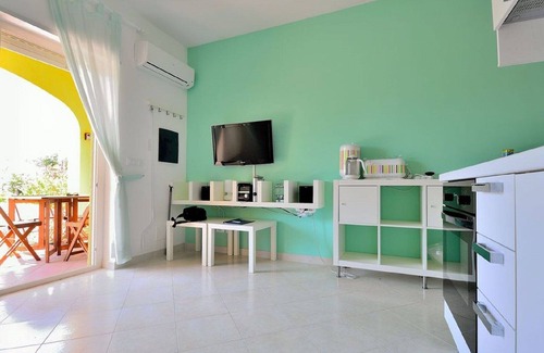 Pizzo Apartment | Green Bay; a comfortable one-bedroom ground floor apartment with communal pool