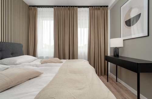Krzyki Apartment | Grey and Beige Apartment by Renters