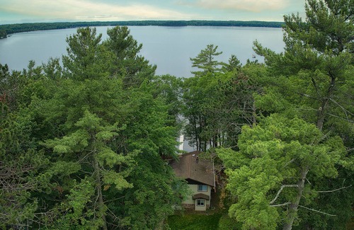 Northwoods Beach Cabin | Grindstone Lake-Hayward 4-bedroom lakefront cabin. Wi-Fi, AC and superb fishing!