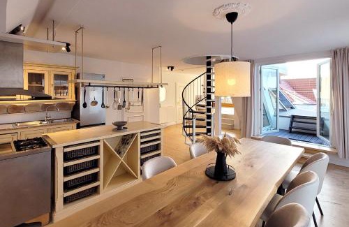 Sierksdorf Apartment | Große Penthouse Ferienwohnung mit Meerblick, Sonnenterrasse & Luxusbad von "Momentic"