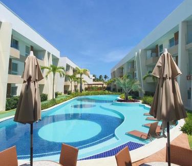 Jenipabu House | Guarajuba Porto Smeralda Village C02, térreo - GUARAJUBA TEMPORADA, viva mais de uma experiência de hospedagem conosco! 130m da praia