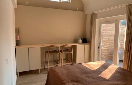 Municipality of Texel Bed & Breakfast | Guest room with terrace at the Wadden Sea