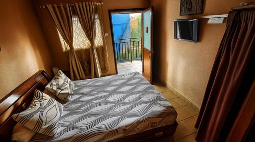 Amoron'i Mania Hotel | Hôtel restaurant le MIAMIAM GLOUGLOU