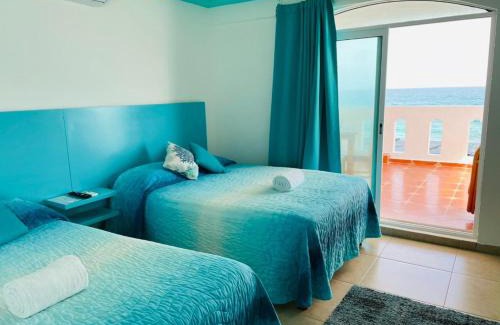 Colonia Meteorologico Apartment | Habitación Amanecer Turquesa #2