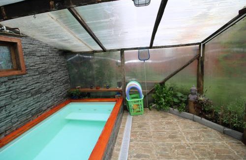 Lenca Apartment | Habitación cocina y Quincho con Piscina temperada