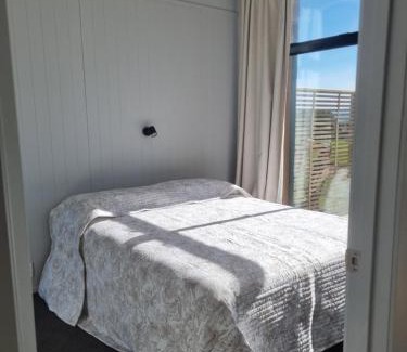 Clarks Beach Apartment | Harbour and rural views