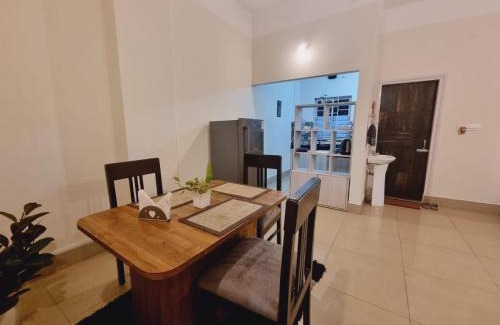Sualkuchi Apartment | Harmony Hideaway by Happy Home Living 2 room unit with kitchen