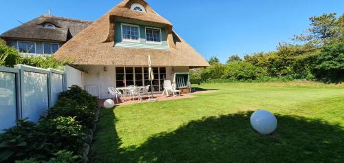 Archsum House | Haus Caluschi