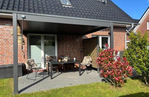 Dornum House | Haus Nordseeliebe mit Außensauna, Outdoor Dusche und Wallbox