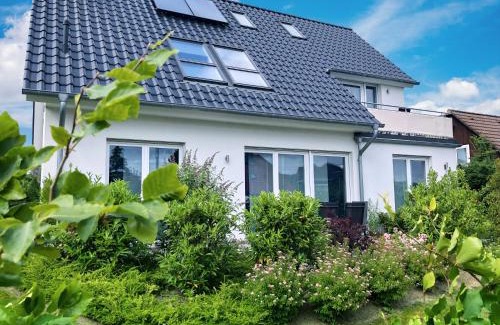 Alt-Travemunde/Ronnau Apartment | Haus Tulle - 2 Ferienwohnungen Schnupp & Lütte mit Saisonstrandkorb