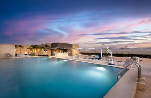 Zona Industrial House | Haven of Relaxation! Free Breakfast and Parking, Outdoor Pool, Pets Allowed!
