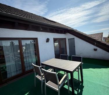 Rembrucken Apartment | HEU1- Spacious City Apartment with Terrace in Heusenstamm