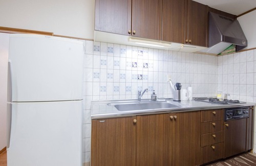 Minami Ward House | Hiroshima Danbara Guesthouse by EXseed