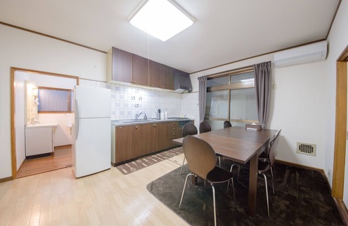 Minami Ward House | Hiroshima Danbara Guesthouse by EXseed