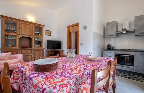 Trinita d'Agultu e Vignola House | Holiday Home 'Rose's House' with Lateral Sea View, Private Terrace and Private Garden