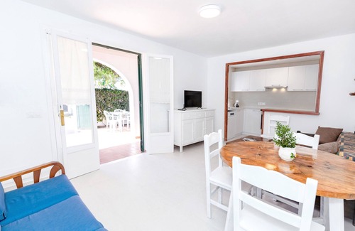 Cap d'Artrutx Apartment | Holiday Home 'Casa Joana' with Private Terrace, Private Garden and Wi-Fi