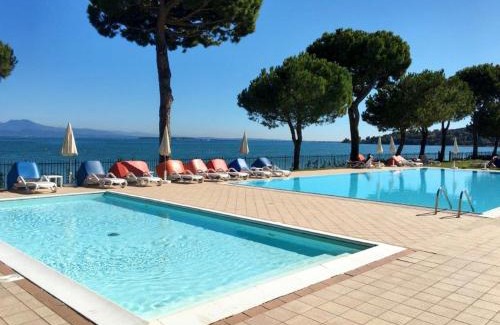 Monte House | Holiday Home Front Lake Resort Le Corti del Lago-4 by Interhome