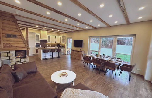 Dolgen am See House | Holiday Home MILA with Pool, Sauna, and Large Private Grounds