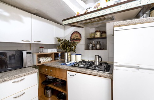 Casalini House | Holiday Home 'Trullo Antica Pietra' with Private Terrace, Private Garden and Air Conditioning