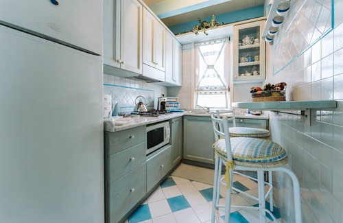 Nora House | Holiday Home 'Villa Marilisa' with Private Terrace, Private Garden and Air Conditioning