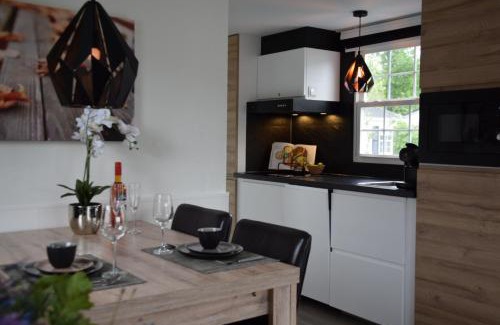 Oisterwijk Ski Chalet | Holiday Inn 30 Oisterwijk # Hygiëne # Airport Eindhoven # Airco # Bosrijk # Hiking & Biking # Efteling # Safaripark