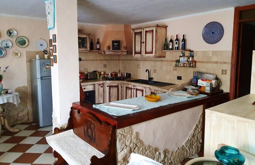 Case Peschiera-Lu Fraili Apartment | Homerez - Amazing appartement 2 km away from the beach for 4 ppl. with garden
