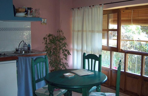 Robledillo de Gata Apartment | Homerez - Apartment garden view - Robledillo de Gata.