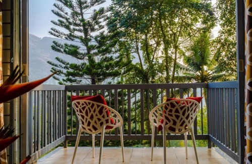 Devikolam House | Homestay with Serine Views, Pool, and delicious local food.