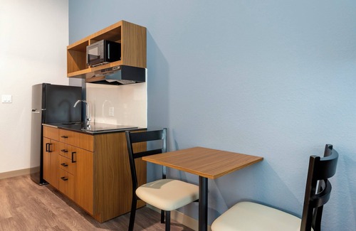 Bearss Plaza Hotel | HomeTowne Studios by Red Roof Tampa - Airport