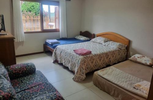 Centro House | Hospedagem Sil e Jean quarto família, cozinha compartilhada com outros hóspedes